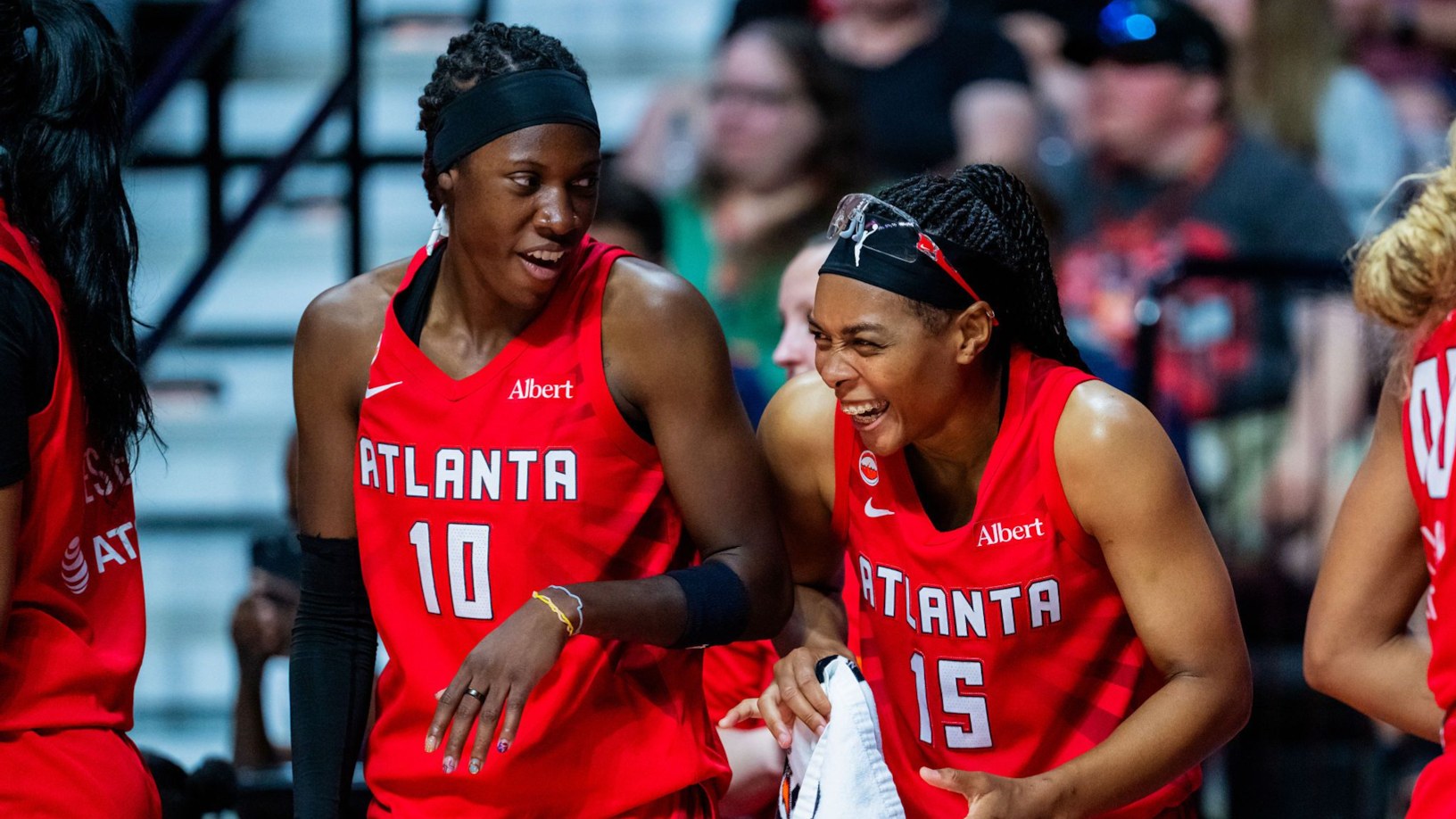Atlanta Dream players Rhyne Howard and Allisha Gray celebrate during a 2026 WNBA game