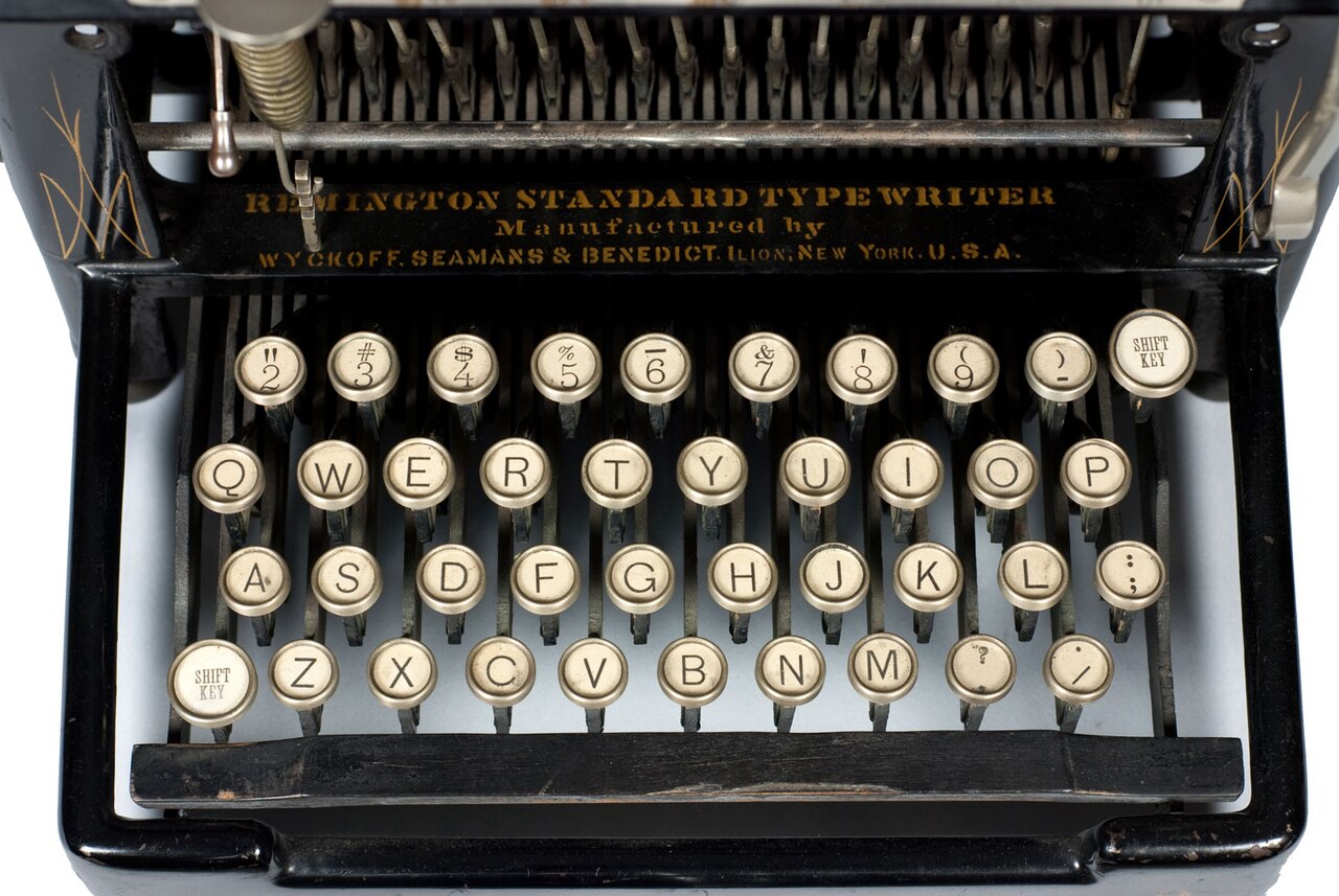 Close-up of a vintage Remington typewriter keyboard, keys worn from use