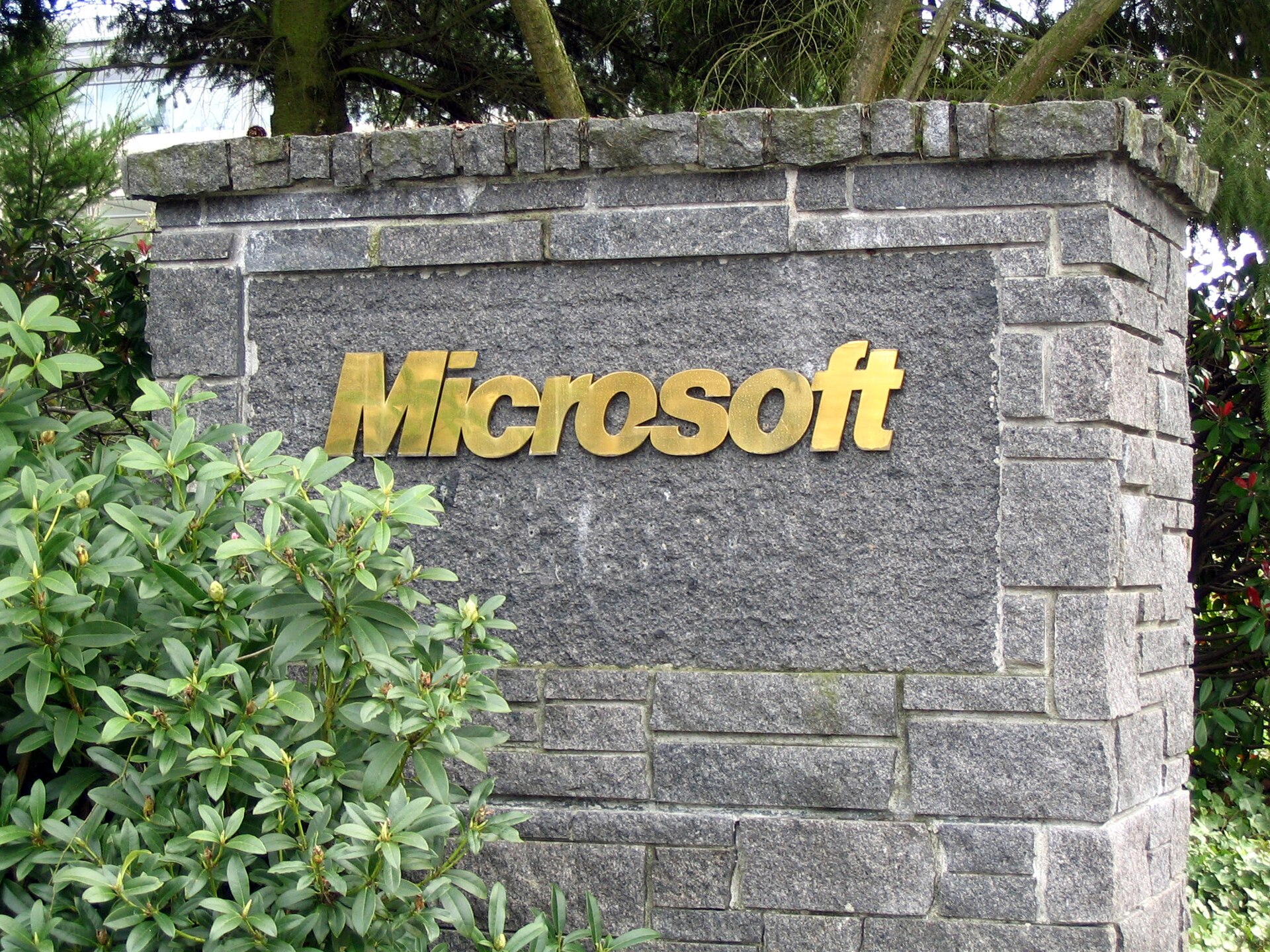 A close-up photograph of a Microsoft sign at the company's campus