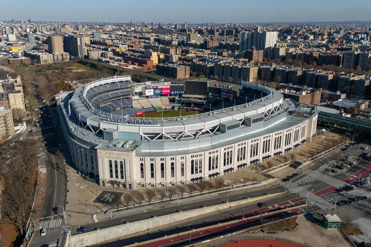 An aerial view of Yankee Stadium on a bright day — the Yankees face elimination there Wednesday night