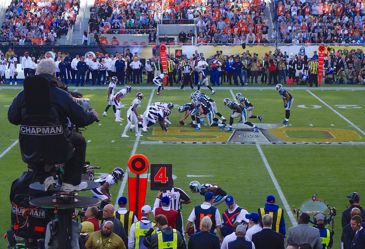 NFL game day action on a bright afternoon